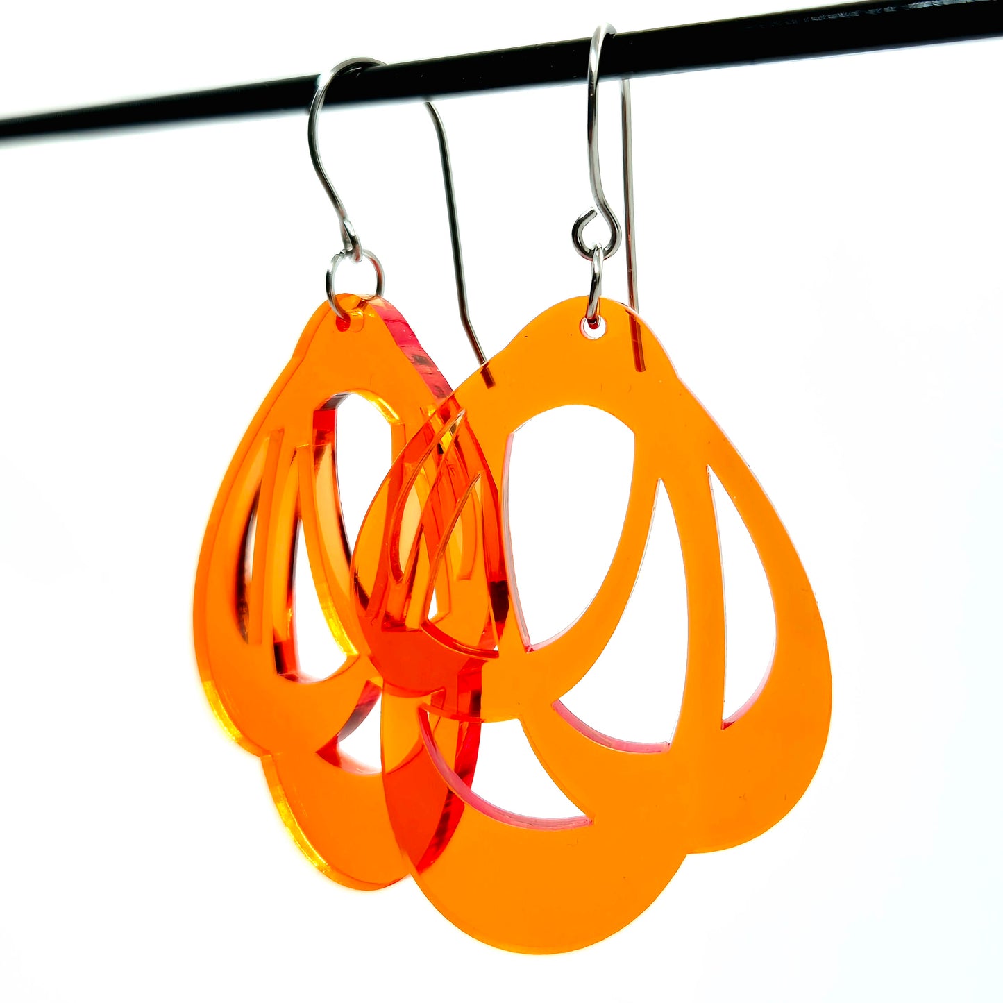 ÖRHÄNGEN LOOPS CLEAR ORANGE