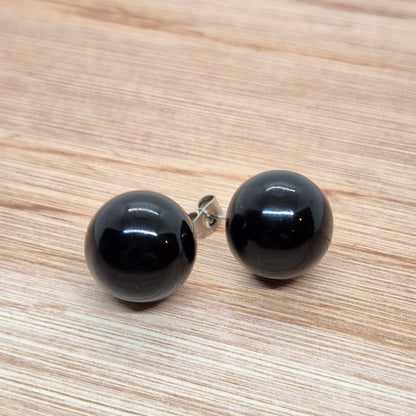 ÖRHÄNGEN KNAPPAR SVARTA